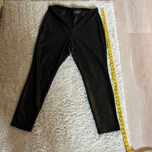 Black fake leather leggings. Large. Never worn. Excellent condition.